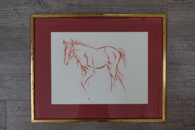 A framed and glazed early 20th Century study in red pastel of a stylised horse.