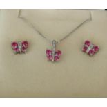 A 9ct white gold butterfly pendant and earring set, 4.