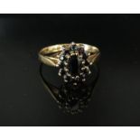 A 9ct gold sapphire cluster ring, size N, 1.