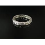 A white gold diamond eternity ring, size L,