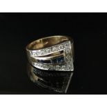 A yellow gold sapphire and diamond set tapered ring, stamped 500. Size Q, 6.