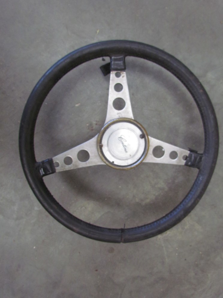 A leather bound and stainlessteel Cortina steering wheel