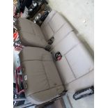 Two Toyota land cruiser leather rear seats one has a rip to the base