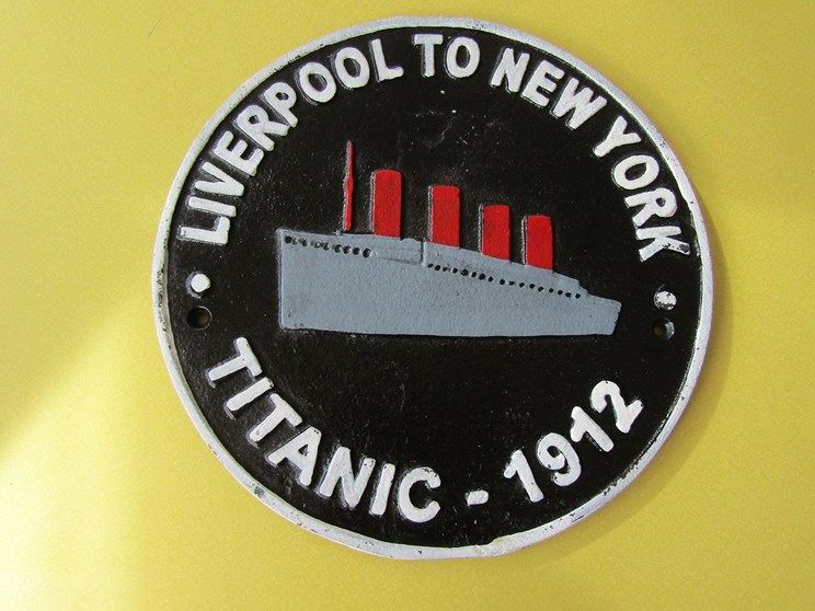 A cast reproduction Titanic plaque