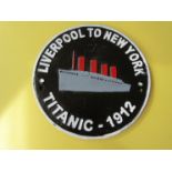 A cast reproduction Titanic plaque