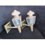 A pair of brass carriage lamp wall lights