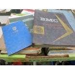 A box of auto manuals including Morris,