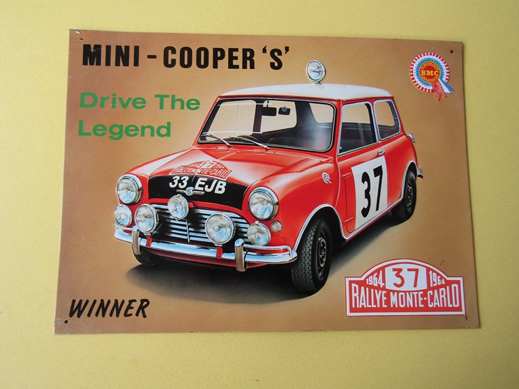 Two Mini Cooper tin signs