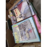 A box of books including Haynes manuals etc