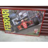 A Ferrari poster bearing signature Nigel Mansell