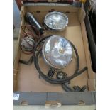 A box containing a quantity of miscellaneous auto parts, including a vintage 'Handy Lamp',