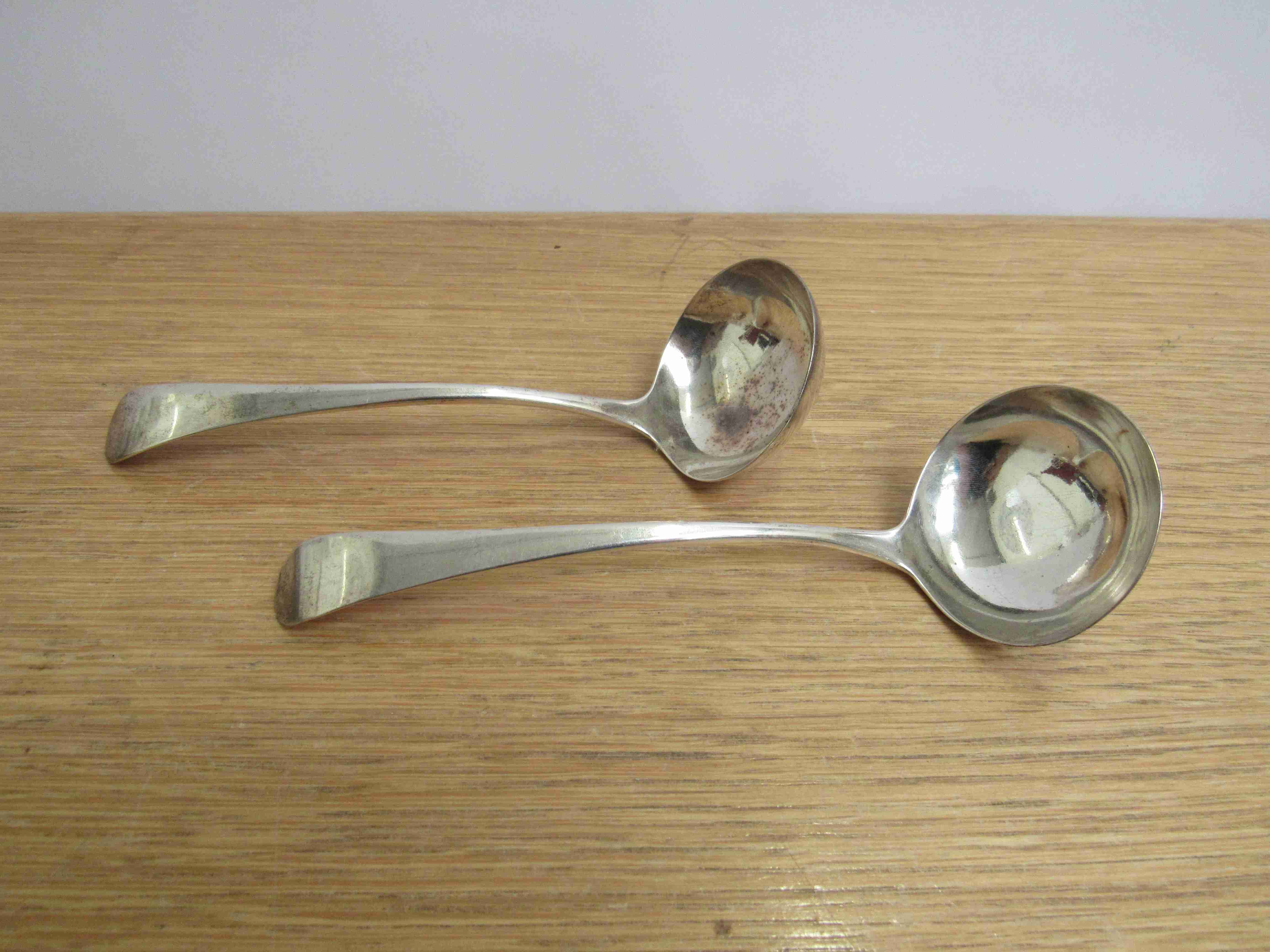 A pair of Hester Bateman silver sauce ladles, London 1788, maker's mark rubbed on one,