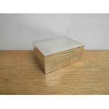 A William Neale & Son Ltd silver cigarette box, plain form with engraved lid, Birmingham 1953.