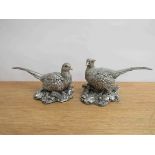 A pair of filled sterling silver pheasant figures approx 19cm long