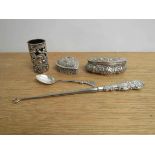 A silver heart form trinket pot, two dressing table containers,