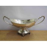 A circa 1900 silver plate twin handled centre bowl with swan handles, floral detail,