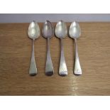 A pair of late George III silver "Old English" pattern table spoons.