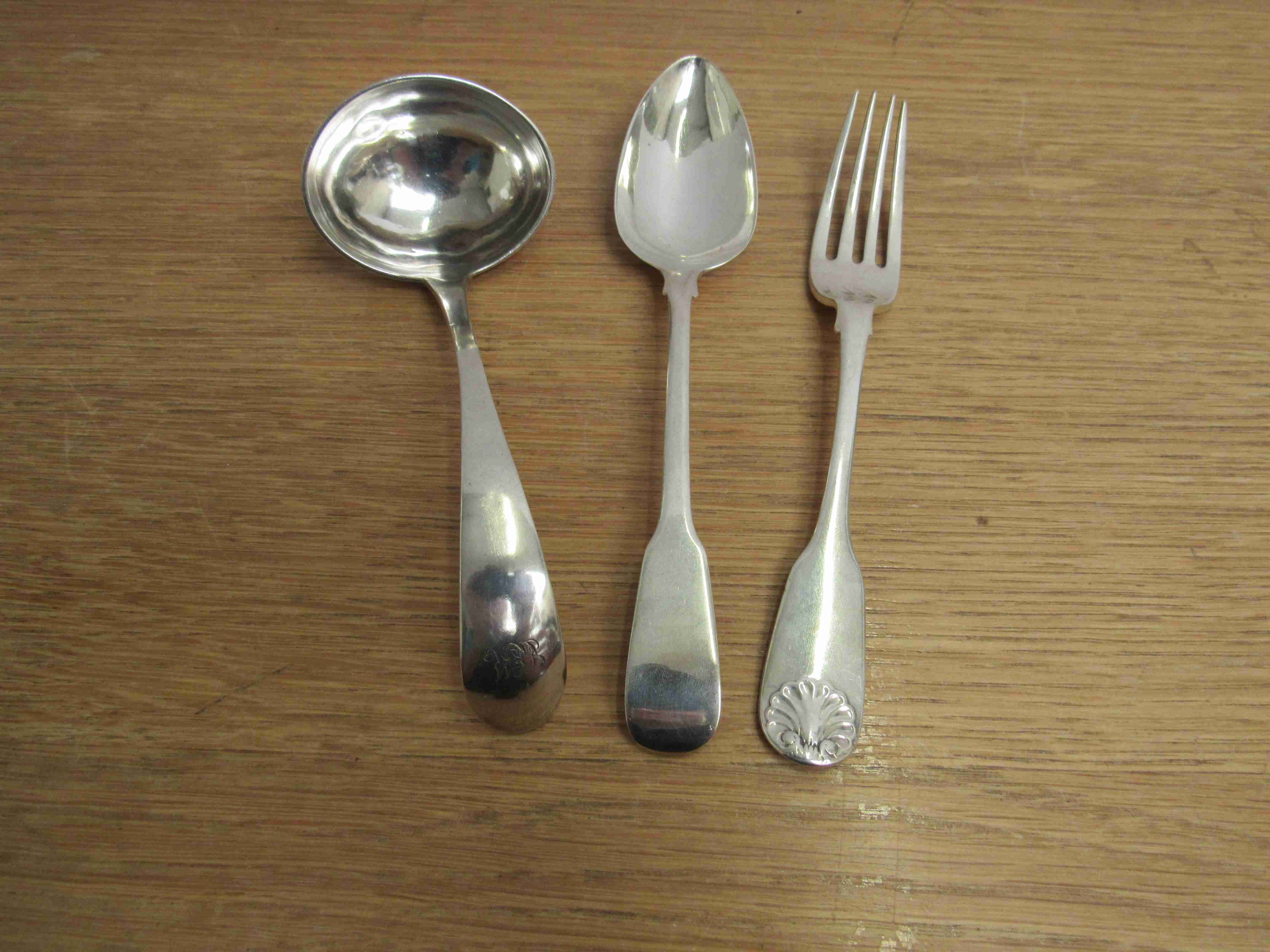 A Victorian silver fork London 1840, spoon dated 1807 and continental silver ladle,