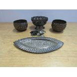 Three Indian white metal bowls and a small bon bon dish and Eastern coin charm bracelet