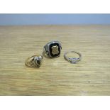 A 9ct white gold ring set with cubic zirconia,