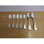 Five silver teaspoons and two dessert spoons, monogrammed handles, various makers and dates,