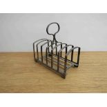 A James Dixon & Sons Ltd silver seven bar toast rack, 13cm long,