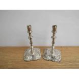 A pair of Thomas Bradbury & Sons silver candlesticks, London 1897, 13.