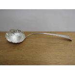 A Hester Bateman silver ladle with scallop form bowl, monogrammed handle, London 1761, 34cm long,