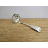 An early Victorian silver "Fiddle" pattern sifting spoon, London 1838,