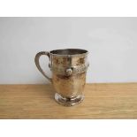 A Thomas Smith & Sons, Edinburgh silver Celtic design tankard with ornate band, hammered body, 1905,