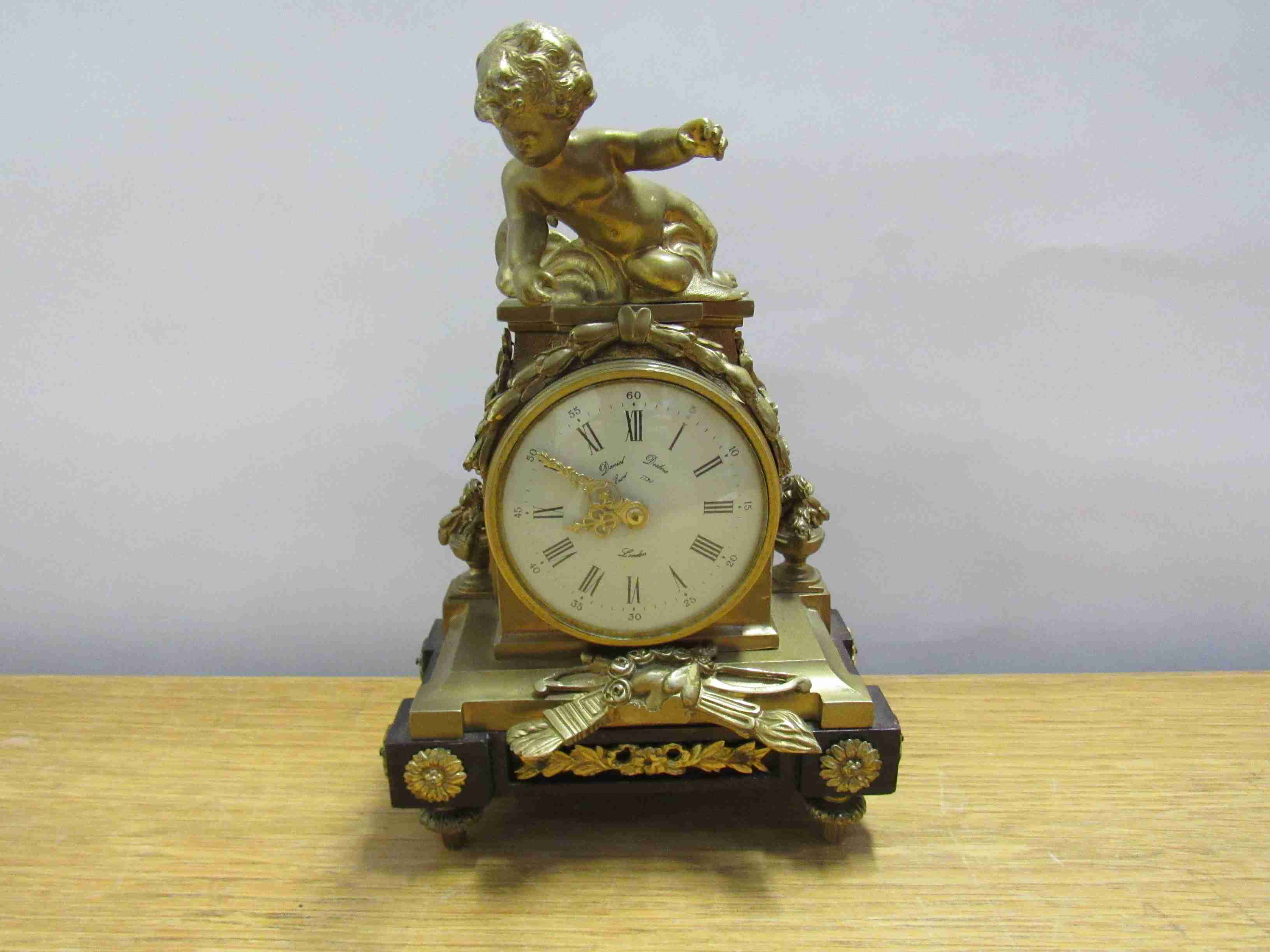 A gilt mantel clock by Daniel Desbois, London,