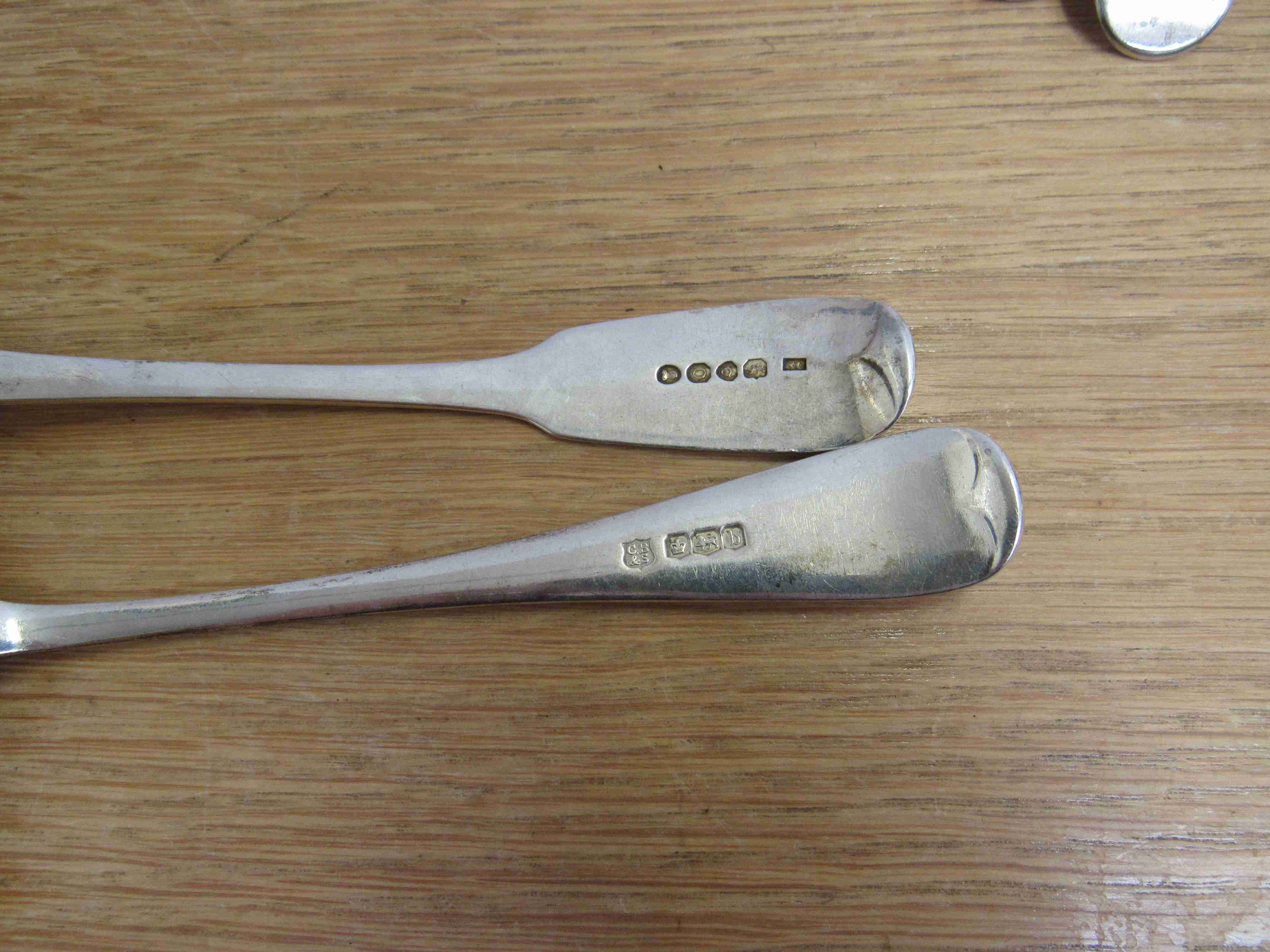 Four silver serving spoons two by Cooper Brothers & Sons Sheffield 1919 with monogrammed handles, - Image 2 of 2