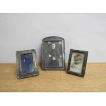Three silver photograph frames, various sizes,