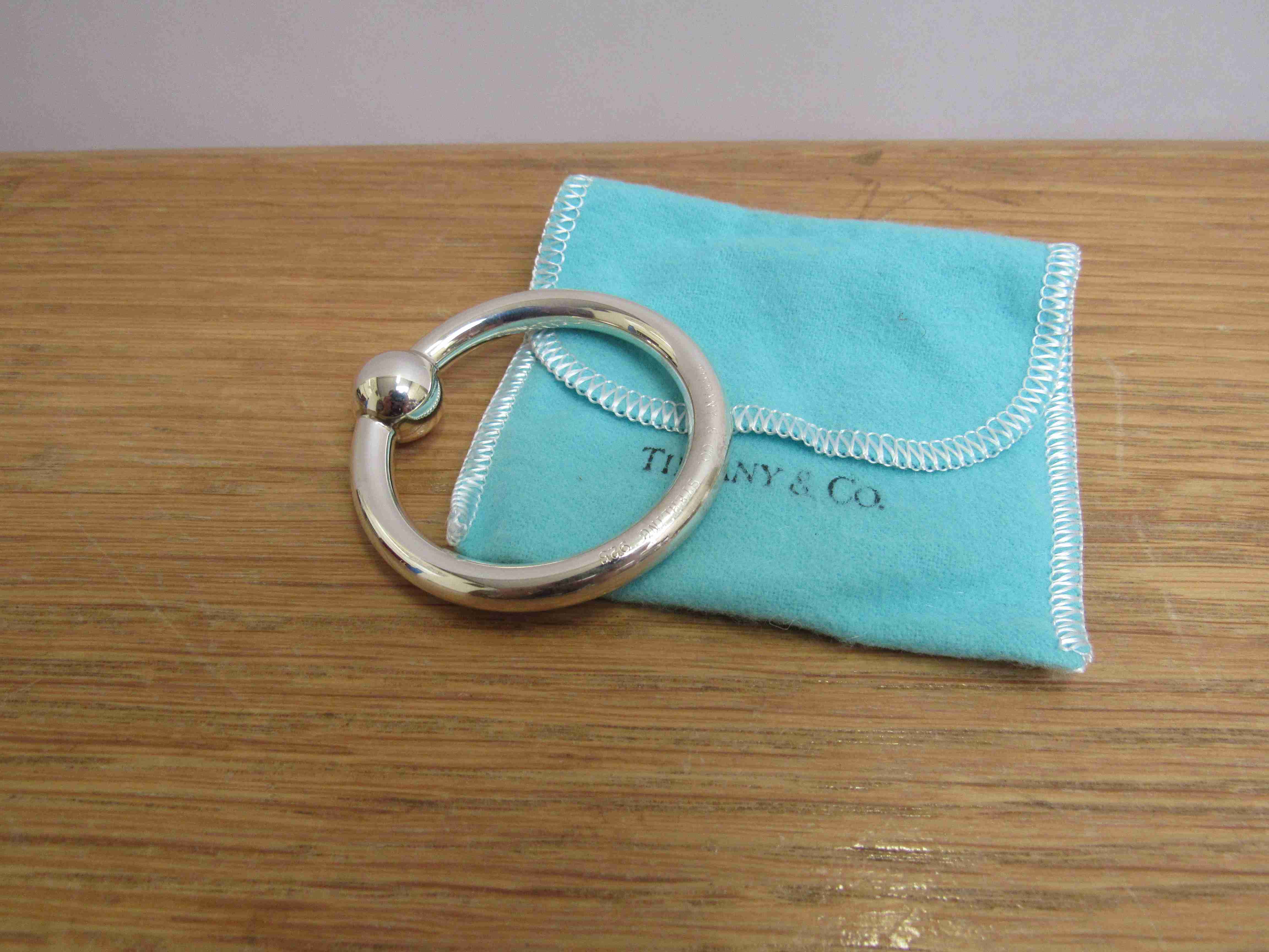 A Tiffany & Co sterling silver teething ring with box,