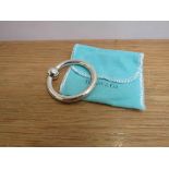 A Tiffany & Co sterling silver teething ring with box,