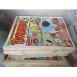 A box of Dandy comics