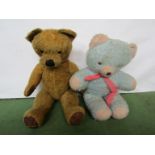 A jointed straw filled bear and a light blue soft filled bear