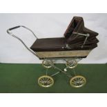 A Silver Cross dolls pram with canopy