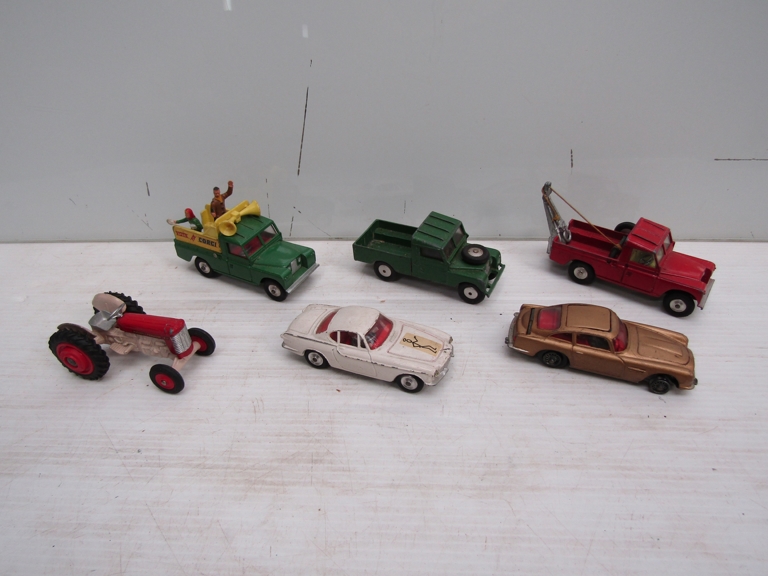 Six assorted played with Corgi diecast vehicles to include James Bond Aston Martin D.B.