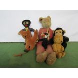 A collection of vintage soft toys including small jointed bear