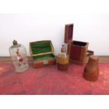 A carriage clock case, leather cased perfume bottle, miniature case and glass bottle (4).