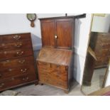 An unusual Georgian mahogany bureau bookcase bespoke made for a sloping wall, 170cm tall, 81cm wide,