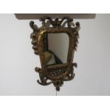 A pair of 19th Century gilt mirrors with scroll and acanthus detail, lattice panel, 55cm x 33cm.