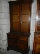 A mahogany 2 door bookcase.