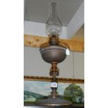 An Arts & Crafts unrestored oil lamp circa 1910.