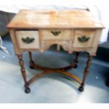 An old 3 drawer lowboy.