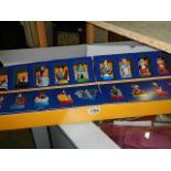 A Macdonald's Disney Land Paris presentation case with figures.