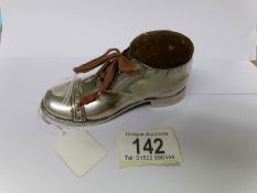 A silver boot pin cushion with Birmingham hall mark.