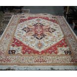 A beige ground heriz rug, 280 x 200 cm.