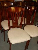 A set of 4 good quality dining chairs.